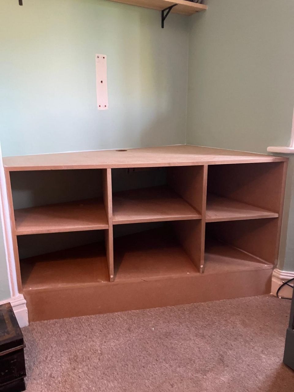 Built-in shelving unit at carcass stage, made to fit an alcove