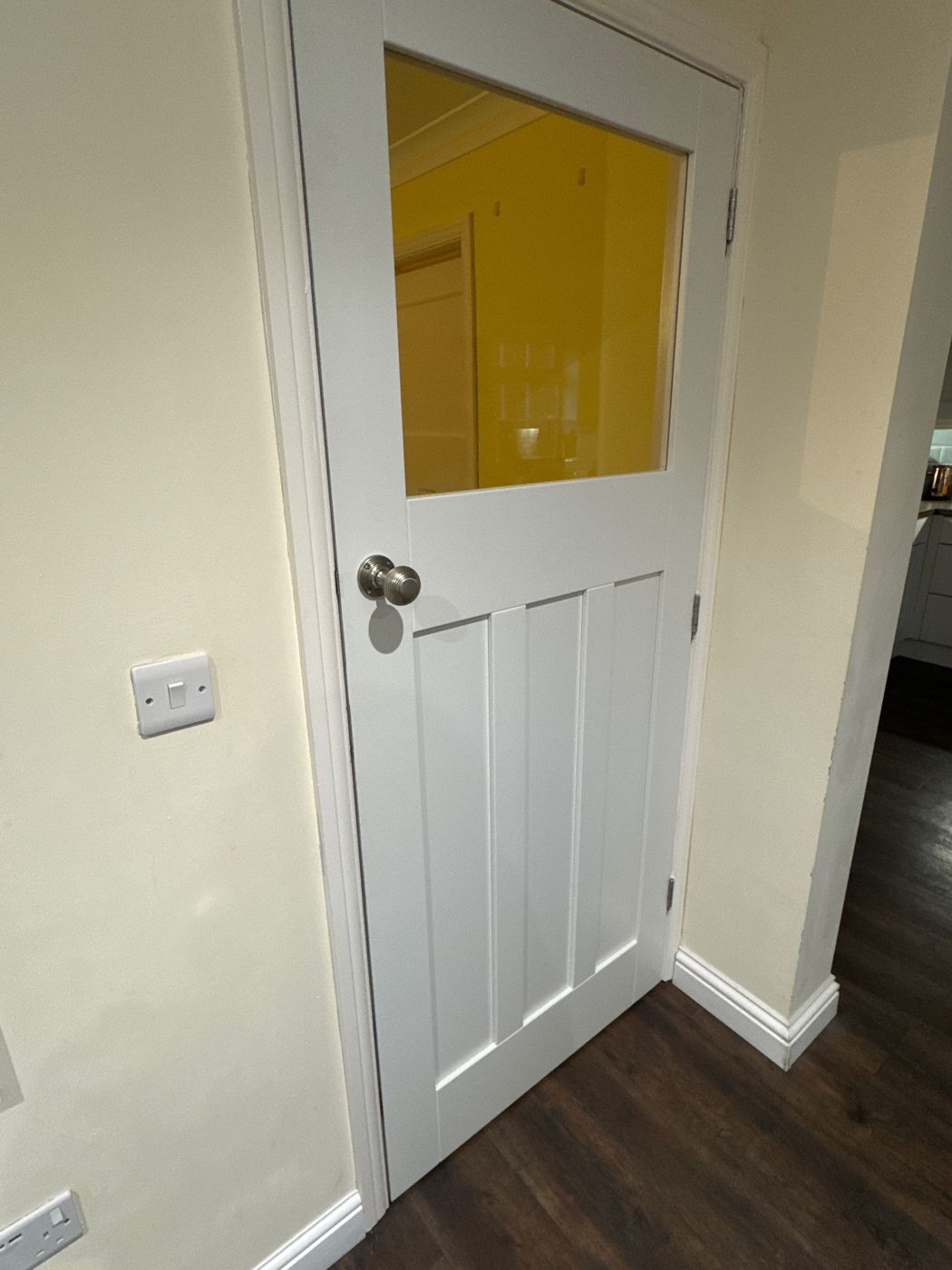 Cottage style panelled internal door hung in a period frame