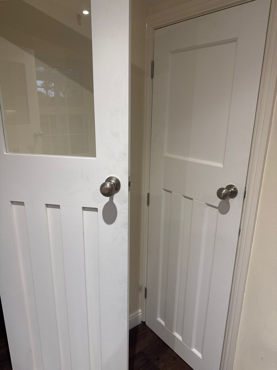 Panelled internal doors hung on existing frames, with ironmongery fitted